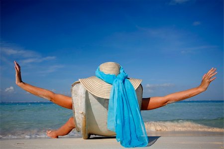 simsearch:400-03950469,k - One of a long series of photos taken on the Mexican Caribbean coast. Woman stretching out on a tropical beach. Stock Photo - Budget Royalty-Free & Subscription, Code: 400-04017459