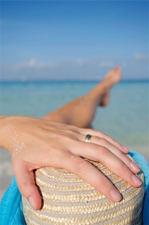 simsearch:400-03950469,k - One of a long series of photos taken on the Mexican Caribbean coast. Woman sunbathing on a great tropical beach. Stock Photo - Budget Royalty-Free & Subscription, Code: 400-04017463