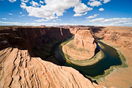 Azure skies, orange cliffs on emerald waters shimmering Stock Photo - Budget Royalty-Free & Subscription, Code: 400-04018119