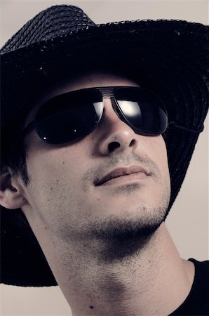 simsearch:400-05888428,k - Portrait of young male wearing dark sunglasses Stock Photo - Budget Royalty-Free & Subscription, Code: 400-04019780