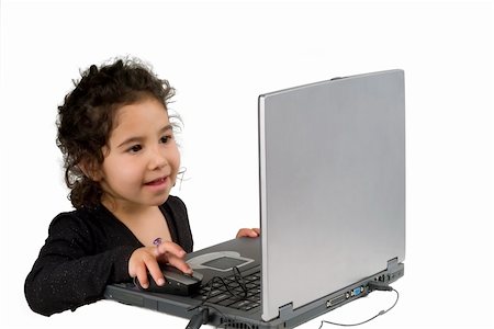 simsearch:400-07509444,k - littel girl playing with laptop computer Stock Photo - Budget Royalty-Free & Subscription, Code: 400-04010497