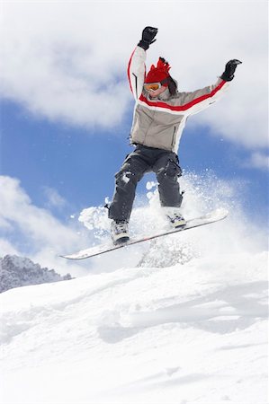 simsearch:400-03985663,k - snowboarder taking jump in fresh powder snow Stock Photo - Budget Royalty-Free & Subscription, Code: 400-04012376