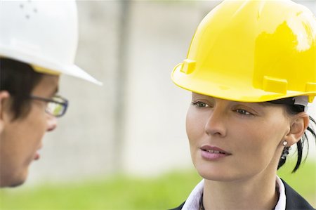 environment construction workers - Young male and female managers working together in an industrial situation Stock Photo - Budget Royalty-Free & Subscription, Code: 400-04013746