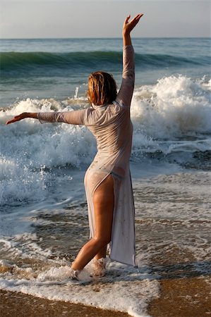 The girl with wet hair on seacoast Stock Photo - Budget Royalty-Free & Subscription, Code: 400-04024276