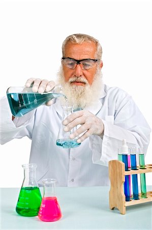 simsearch:400-05669968,k - Mature scientist in laboratory isolated on white Stock Photo - Budget Royalty-Free & Subscription, Code: 400-04026168