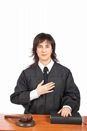 simsearch:700-00028739,k - A female judge taking oath in a courtroom, isolated on white background. Shallow depth of field Stock Photo - Budget Royalty-Free & Subscription, Code: 400-04028029