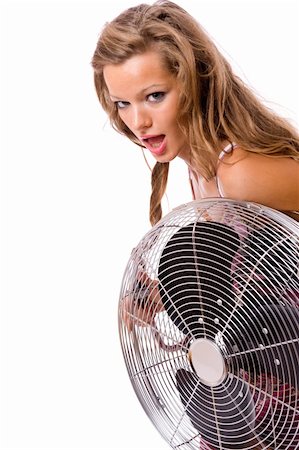 simsearch:400-05678958,k - Sexy young girl uses the fan isolated on white background Photographie de stock - Aubaine LD & Abonnement, Code: 400-04028483