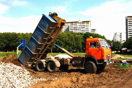 semi truck car carriers - Orange dump track in city park Stock Photo - Budget Royalty-Free & Subscription, Code: 400-04028826