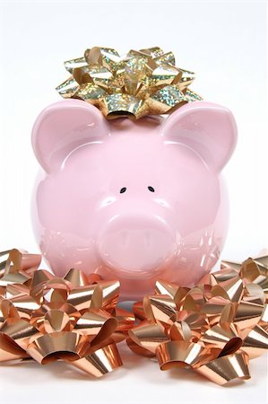 simsearch:400-06077471,k - Pink Piggy Bank on isoalted on white background with christmas bows Stock Photo - Budget Royalty-Free & Subscription, Code: 400-04020158