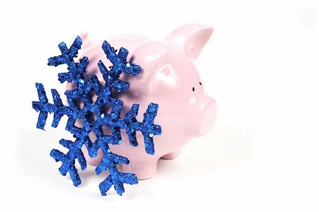 simsearch:400-06077471,k - Pink Piggy Bank on isoalted on white background with blue snowflake Stock Photo - Budget Royalty-Free & Subscription, Code: 400-04020159