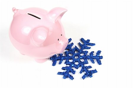 simsearch:400-06077471,k - Piggy Bank with snowflake - Concept of heating cost the the Winter months Stock Photo - Budget Royalty-Free & Subscription, Code: 400-04020160