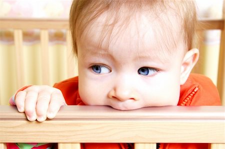 simsearch:400-05153083,k - Little Baby Bitting on crib Stock Photo - Budget Royalty-Free & Subscription, Code: 400-04020219