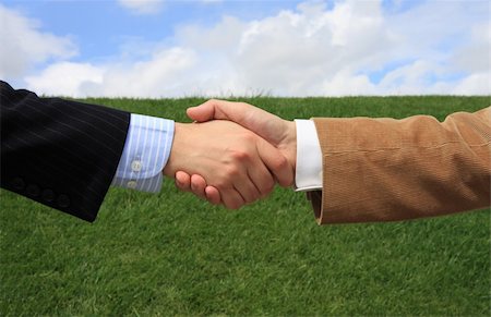 simsearch:400-04609965,k - Two business men making a deal with a handshake at the field Stock Photo - Budget Royalty-Free & Subscription, Code: 400-04020574