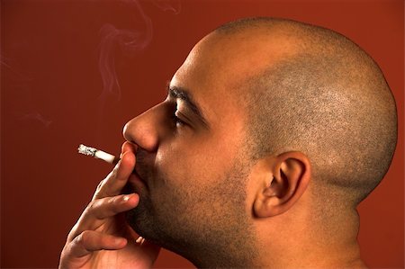 simsearch:400-05207678,k - close up of an smoking man Stock Photo - Budget Royalty-Free & Subscription, Code: 400-04020738