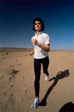 simsearch:400-04535435,k - Young woman jogging in desert Stock Photo - Budget Royalty-Free & Subscription, Code: 400-04034955