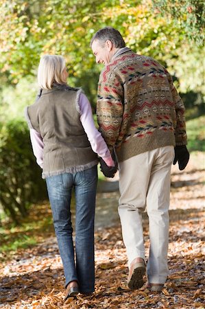 simsearch:400-04035087,k - Senior couple on autumn walk through woodland Stock Photo - Budget Royalty-Free & Subscription, Code: 400-04035006