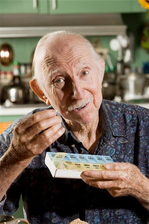 Portrait of Elder Man Discussing Medications Stock Photo - Budget Royalty-Free & Subscription, Code: 400-04035510