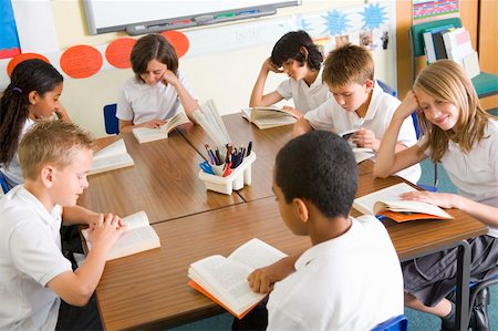 Schoolchildren reading books in class Stock Photo - Budget Royalty-Free & Subscription, Code: 400-04036524