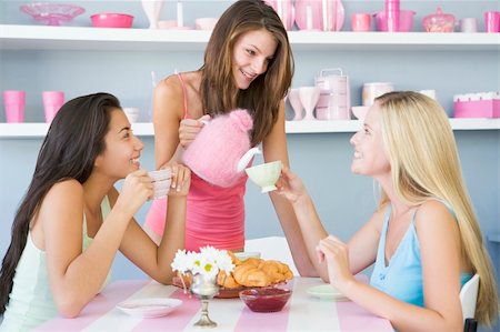 Three young women in their underwear having a tea party Stock Photo - Budget Royalty-Free & Subscription, Code: 400-04037621