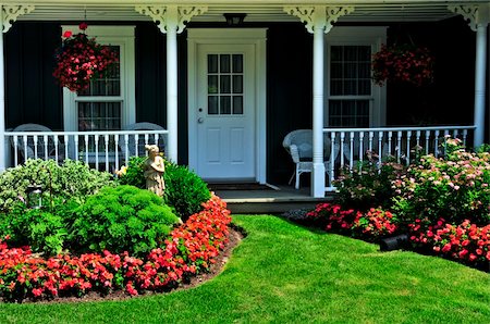 Landscaped front yard of a house with flowers and green lawn Stock Photo - Budget Royalty-Free & Subscription, Code: 400-04038126