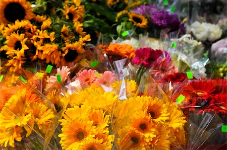 flower sale - Bouquets of colorful flowers for sale at flower stand Stock Photo - Budget Royalty-Free & Subscription, Code: 400-04038123