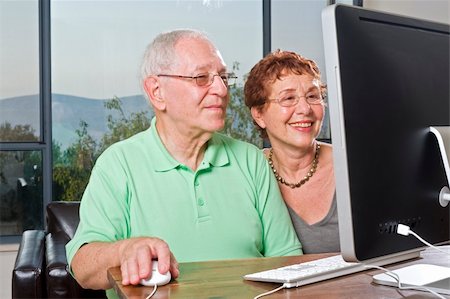 simsearch:400-07426233,k - senior couple using an imac computer Stock Photo - Budget Royalty-Free & Subscription, Code: 400-04038476