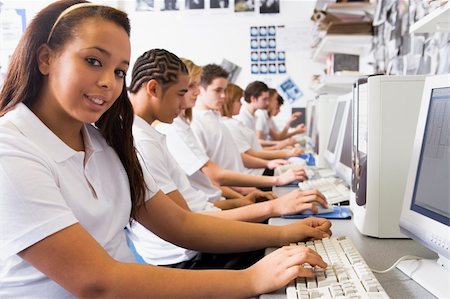 Row of schoolchildren studying in front of a computer Stock Photo - Budget Royalty-Free & Subscription, Code: 400-04038544