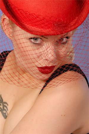 simsearch:400-05062363,k - pretty girl with sensual expression, wearing red hat Stock Photo - Budget Royalty-Free & Subscription, Code: 400-04039301