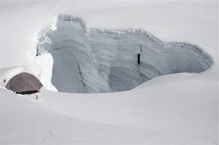 simsearch:400-05118687,k - Hiding from strong wind near crevasse at 5300m, Cordillera Blanca, Peru Stock Photo - Budget Royalty-Free & Subscription, Code: 400-04031764