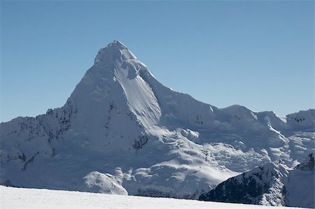 simsearch:400-04269017,k - Nevada Artesonraju, which is rumored to be a prototype for Paramount Pictures logo. Cordillera Blanca, Peru. Photographie de stock - Aubaine LD & Abonnement, Code: 400-04031765