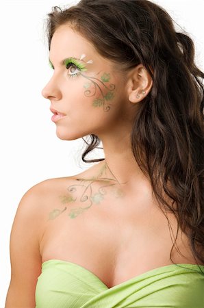 nice portrait of a young woman with paint on her body looking on one side Stock Photo - Budget Royalty-Free & Subscription, Code: 400-04031927
