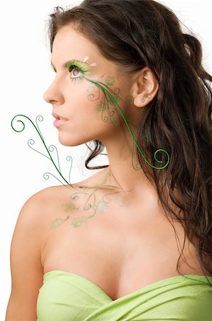 nice portrait of a young woman with paint on her body looking on one side Stock Photo - Budget Royalty-Free & Subscription, Code: 400-04031928