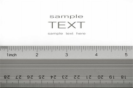 simsearch:400-04424177,k - School metal ruler on white background Stock Photo - Budget Royalty-Free & Subscription, Code: 400-04033719