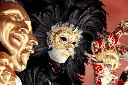 Venetian masks with black feathers on a red background Stock Photo - Budget Royalty-Free & Subscription, Code: 400-04046893