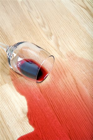 drunk studio - red wine spilled from glass on hardwood floor Stock Photo - Budget Royalty-Free & Subscription, Code: 400-04047387