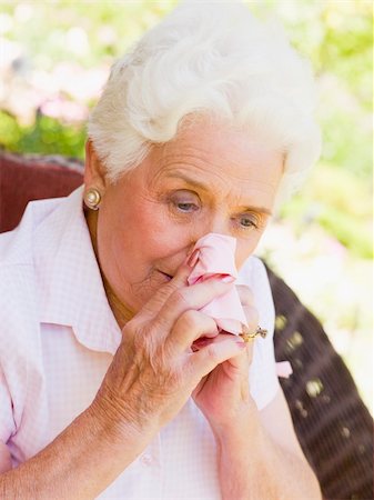 Woman Blowing Her Nose Stock Photo - Budget Royalty-Free & Subscription, Code: 400-04047716