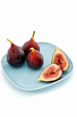 simsearch:824-07586124,k - three whole figs and one sliced one on a square blue plate Stock Photo - Budget Royalty-Free & Subscription, Code: 400-04041136