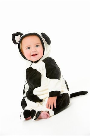 dairy cows looking at camera - Baby in cow costume Stock Photo - Budget Royalty-Free & Subscription, Code: 400-04041795