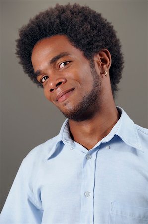 simsearch:400-04732323,k - Portrait of young african american man with pleased expression Foto de stock - Super Valor sin royalties y Suscripción, Código: 400-04042289