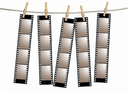 simsearch:400-05102933,k - Blank 35mm Film Strip Negatives Hanging From A Rope By Clothespins Stock Photo - Budget Royalty-Free & Subscription, Code: 400-04042491