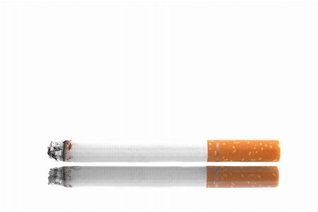 Lit cigarette isolated on a white background Stock Photo - Budget Royalty-Free & Subscription, Code: 400-04042601