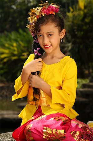 Balinese  Girl In Traditional Dress Stock Photo - Budget Royalty-Free & Subscription, Code: 400-04054276