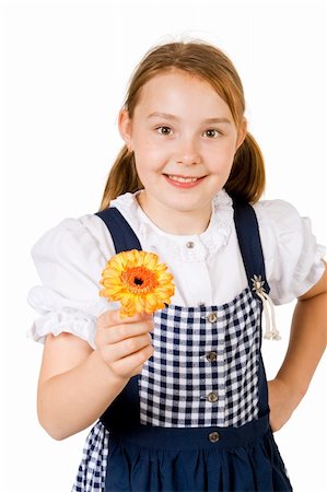 simsearch:400-07509444,k - A pretty girl in a blue and white dress holding a yellow flower Stock Photo - Budget Royalty-Free & Subscription, Code: 400-04054283