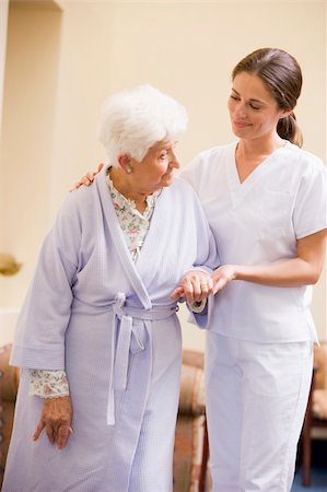 Nurse Helping Senior Woman To Walk Stock Photo - Budget Royalty-Free & Subscription, Code: 400-04050867