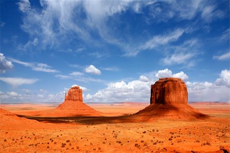 simsearch:862-08091453,k - Monument Valley Buttes With Cloud Cast Shade Dancing Along the Valley Stock Photo - Budget Royalty-Free & Subscription, Code: 400-04052266