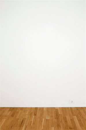 simsearch:600-06808788,k - Blank white wall in a clean room with wooden floor - insert your own design on the wall Photographie de stock - Aubaine LD & Abonnement, Code: 400-04064121