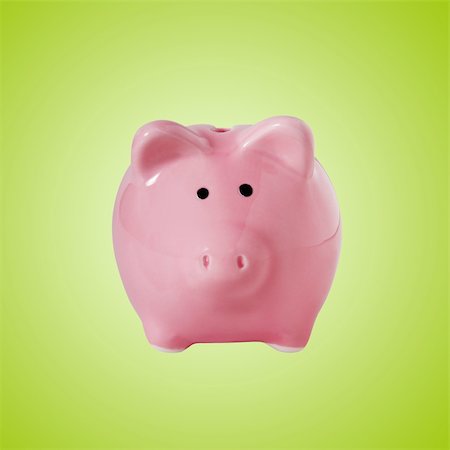 simsearch:400-07218287,k - Traditional piggybank isolated on green with clipping path Stock Photo - Budget Royalty-Free & Subscription, Code: 400-04064265