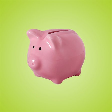 simsearch:400-07218287,k - Pink piggybank made of ceramic isolated on green with clipping path Stock Photo - Budget Royalty-Free & Subscription, Code: 400-04064267