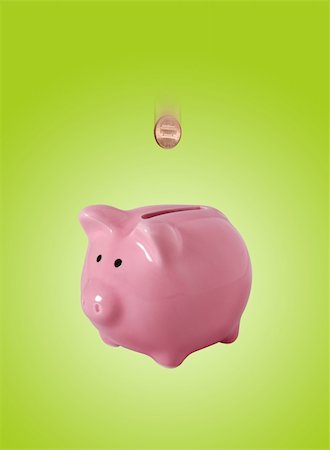 simsearch:400-07218287,k - Pink piggybank made of ceramic isolated on green with clipping path Stock Photo - Budget Royalty-Free & Subscription, Code: 400-04064263