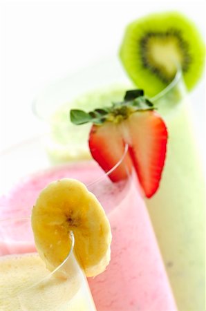 simsearch:824-07586355,k - Assorted fruit smoothies close up on white background Stock Photo - Budget Royalty-Free & Subscription, Code: 400-04064753